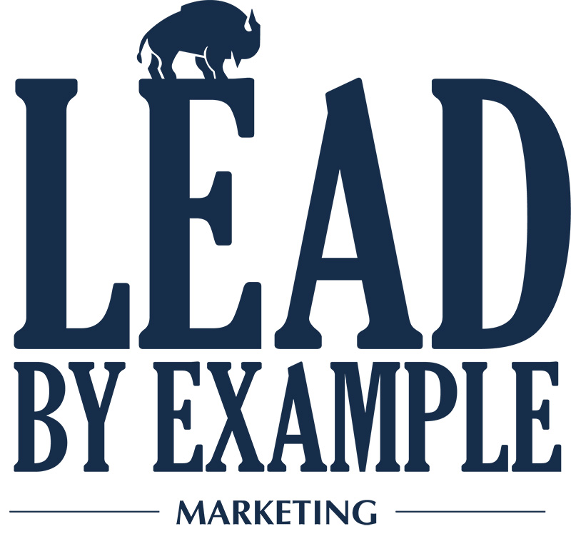 LEAD BY EXAMPLE marketing logo